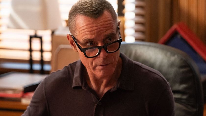 Hank Voight wearing glasses at his desk in Chicago P.D. Season 13x07