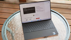 Dell XPS 13 Plus laptop outside on a table