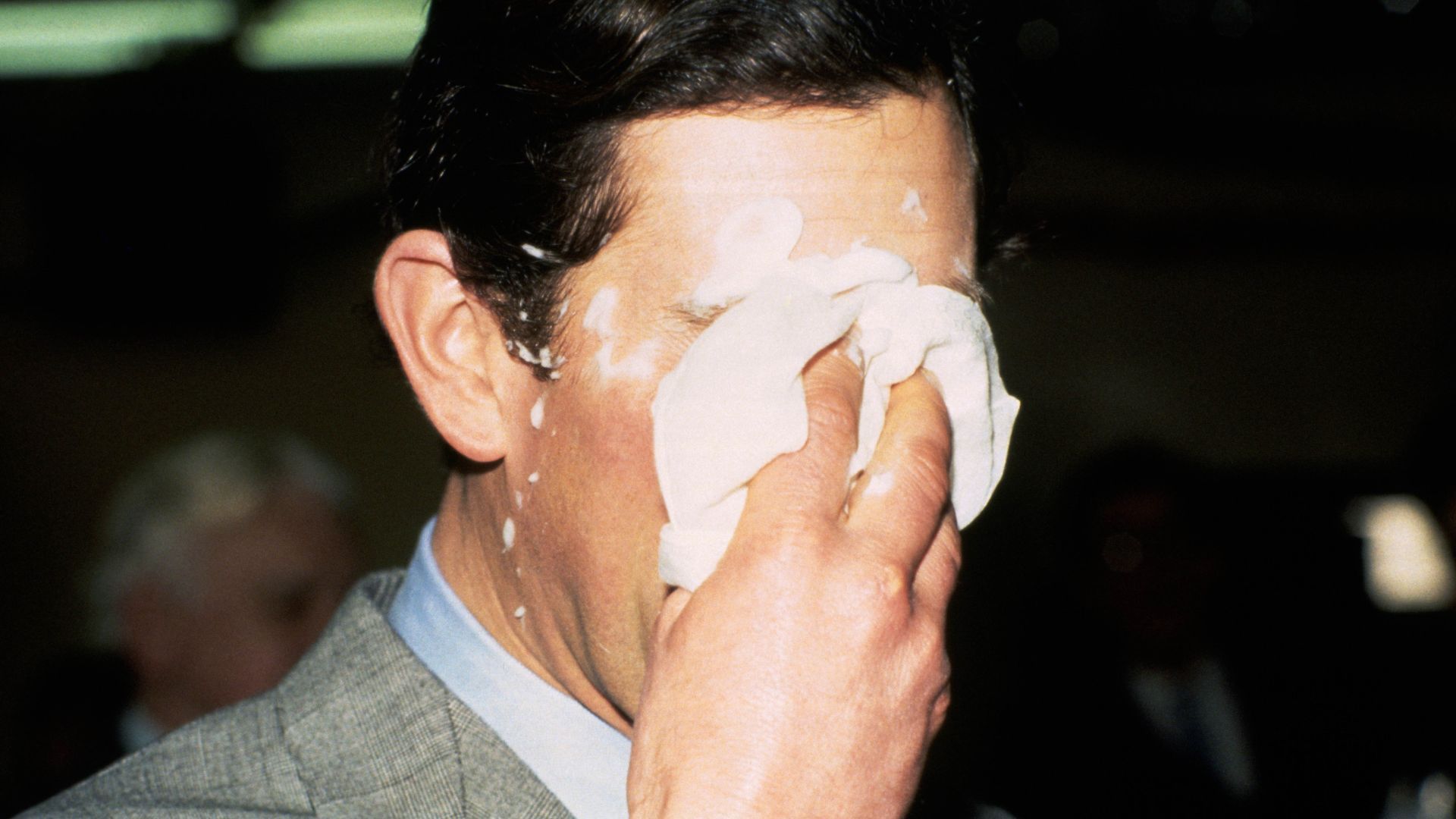 King Charles with a pie on his face.