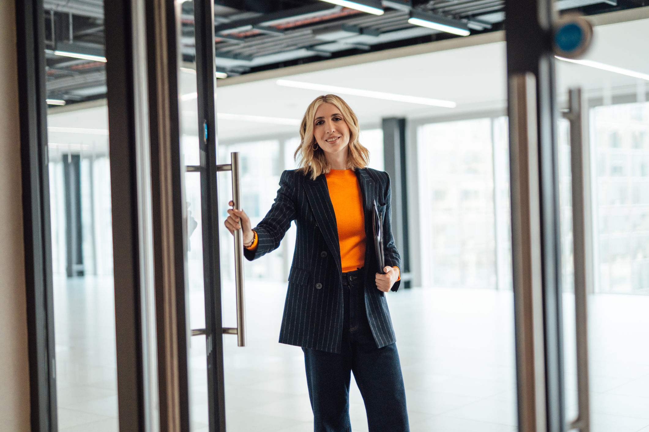 Young financial adviser in a modern office rental