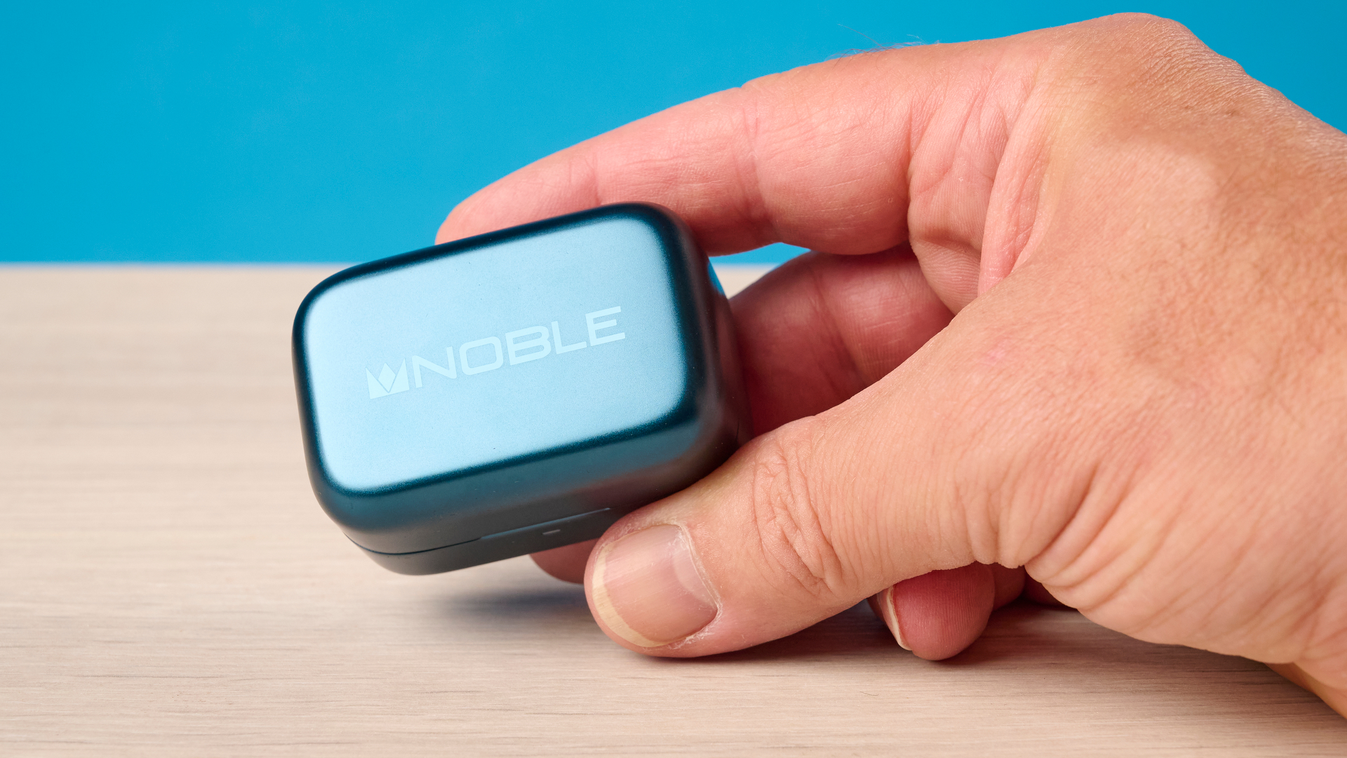 A pair of Noble Audio Osprey wireless earbuds