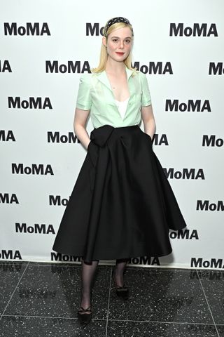 Elle Fanning on red carpets for a complete unknown wearing 60s inspired outfits