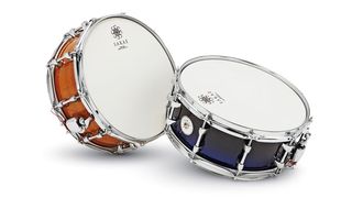 There's a choice of 27 finishes for Sakae's beech snare. Here we have black-to-blue acrylic and silky oak veneer