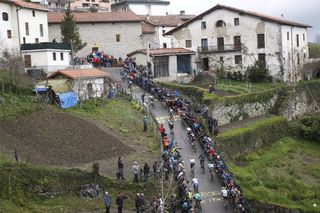Cyclists climb a steep hill on stage four of the 2016 Tour of The Basque Country