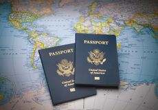 US passports on a world map background