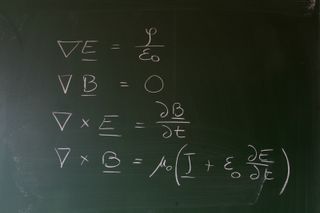 image of Maxwell's equations written on a chalkboard