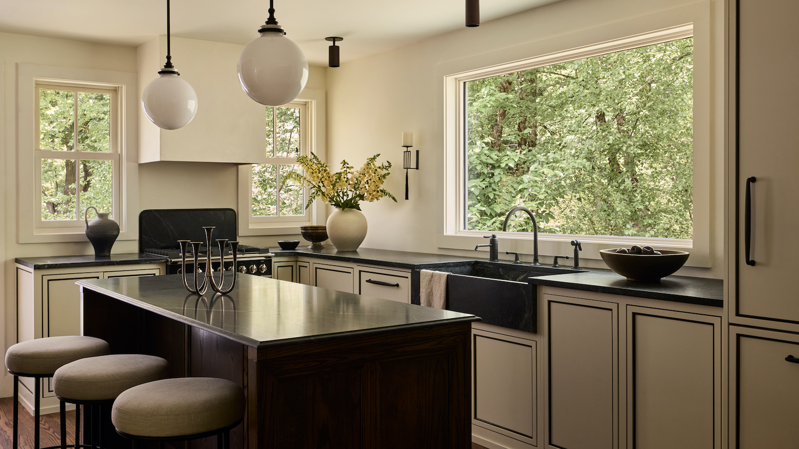 kitchen with black worktop and black stone sink