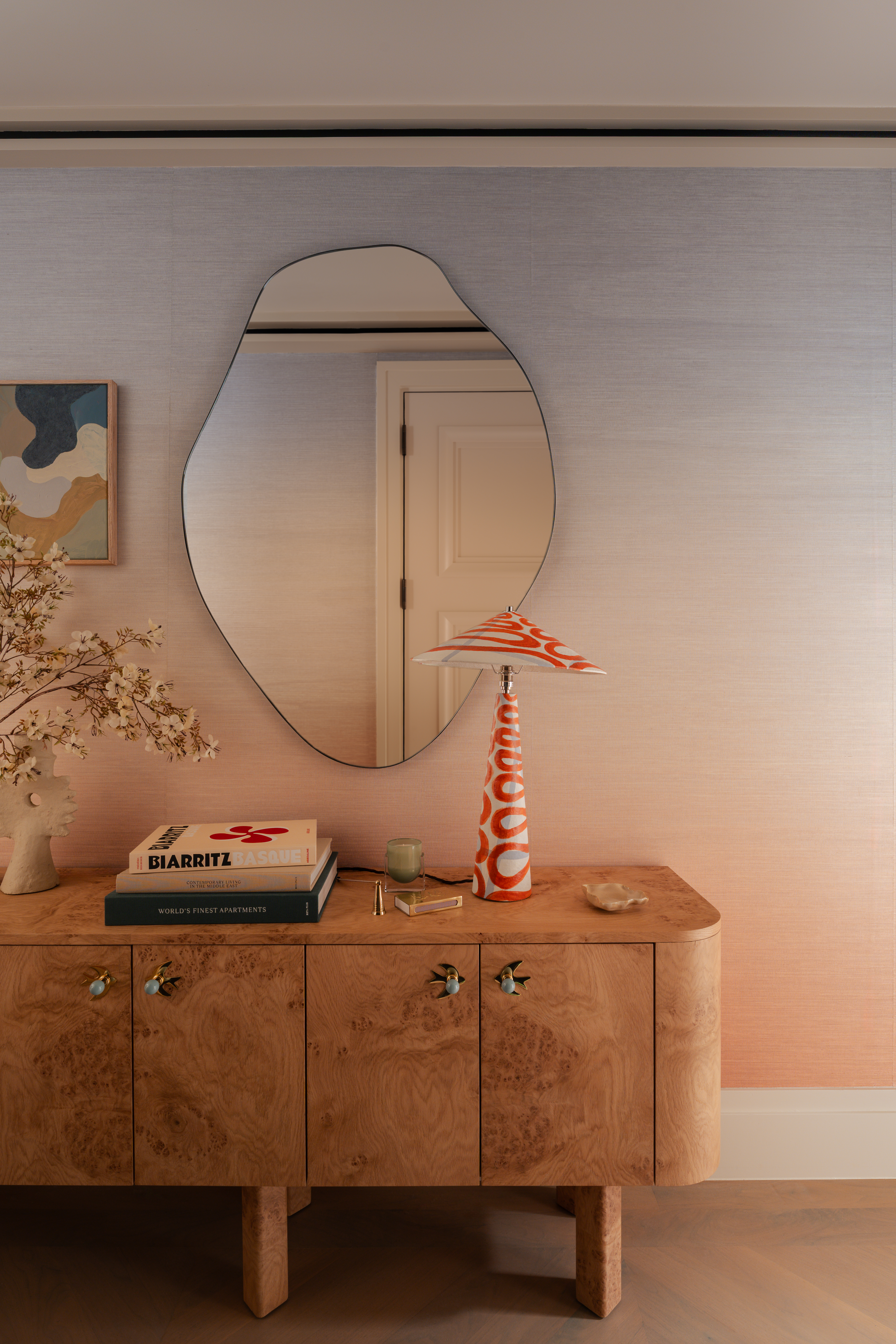 entryway with burl cabinet and ombre wallpaper