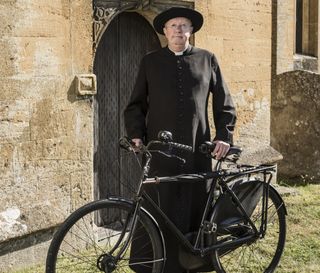 Father Brown on his bike in series eight