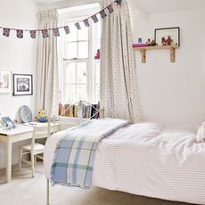 bedroom with bunting and bed