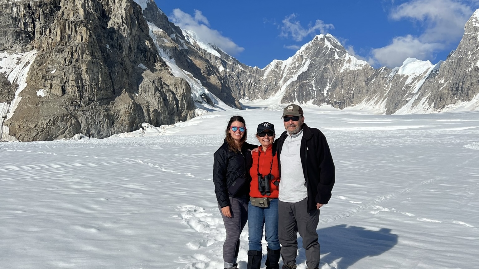 A couple and their adult daughter in Denali, Alaska.
