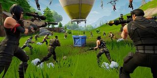 Players rush a supply drop in Fortnite.