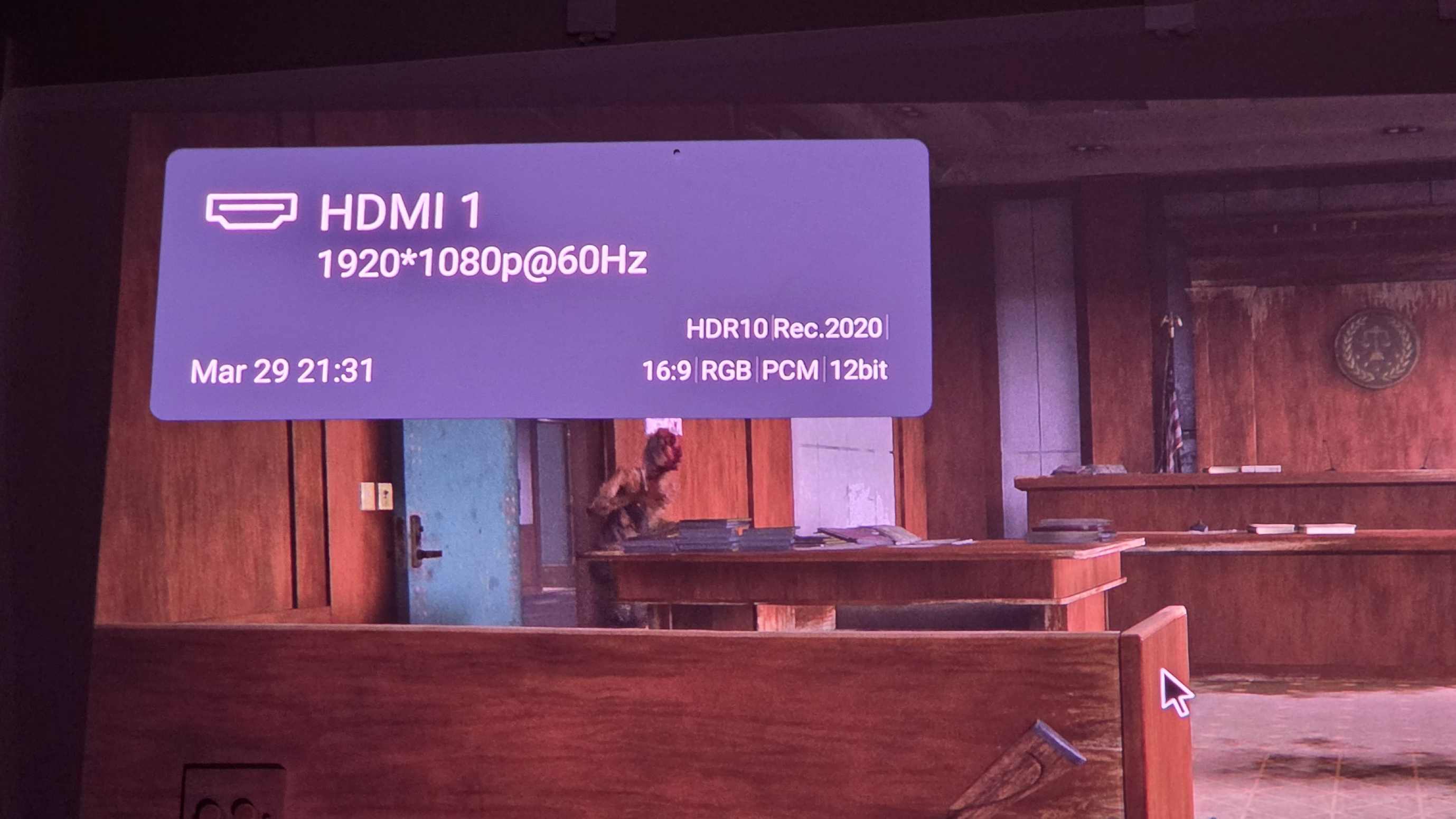 A pop-up from the Valerion VisionMaster 2 Pro, showing connection details, in front of The Last of Us 2.