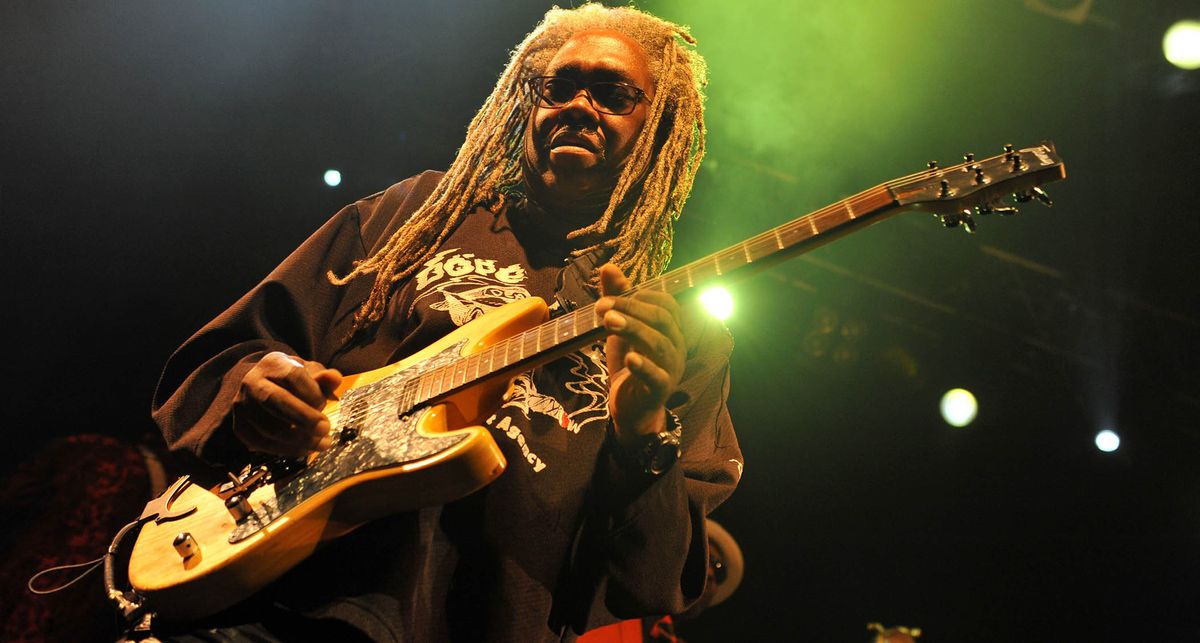 Dwayne &quot;Blackbyrd&quot; McKnight plays an S-style under the green stage lights at London&#039;s Koko, 2015