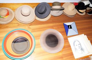 Hats and ceramic plates at Vuokko Nurmesniemi's house in Finland