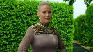 Demerzel standing a bush-based maze in Foundation season 3