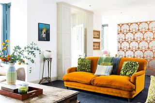 19th century country house orange sofa in living room