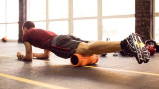 Person doing foam roller quads exercise