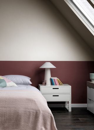 red and cream painted bedroom