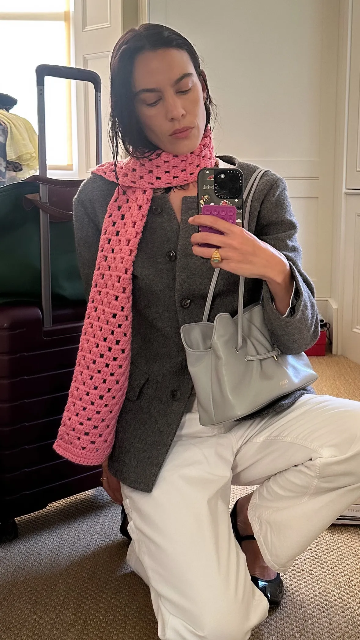 Alexa Chung holding Prada Dada