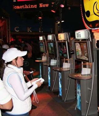Fans played new Wii titles on kiosks outside the store.