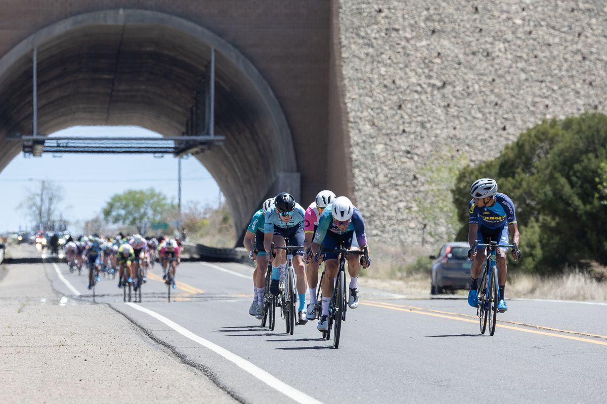 The men's field stretches out on the descent after the 3rd KOM at about 12 miles to go