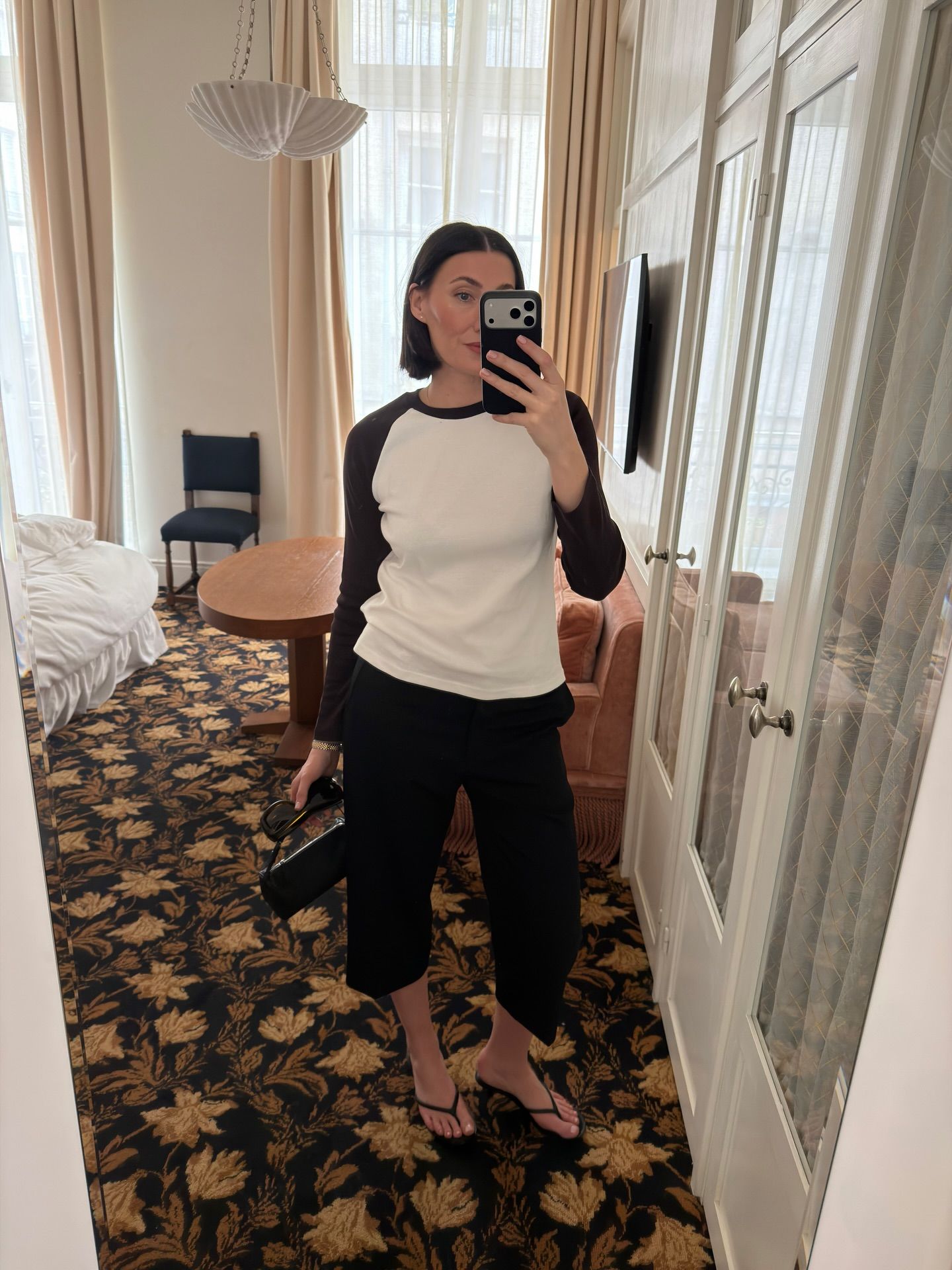An image of @sarahlouiseblythe wearing tassel trousers, one of the best anti-jeans summer trouser trends with a tassel top.