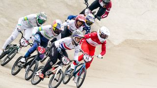 Bethany Shriever of Great Britain leads in front of Saya Sakakibara of Australia and Molly Simpson of Canada in the Women's Elite Final during Round 4 of the 2025 UCI BMX Racing World Cup at Sportcentrum Papendal on June 22, 2025 in Arnhem, Netherlands.