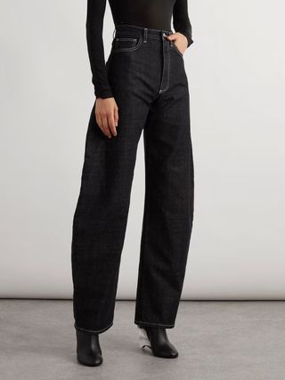 ALAIA, High-Rise Tapered Jeans