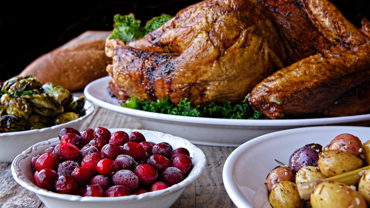 An elegant Christmas with roast turkey, potatoes, sprouts and cranberries