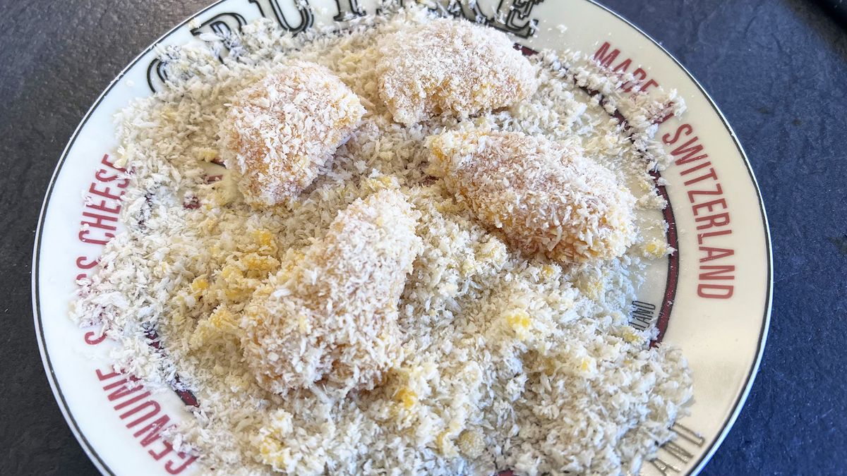 Coating being added to chicken pieces