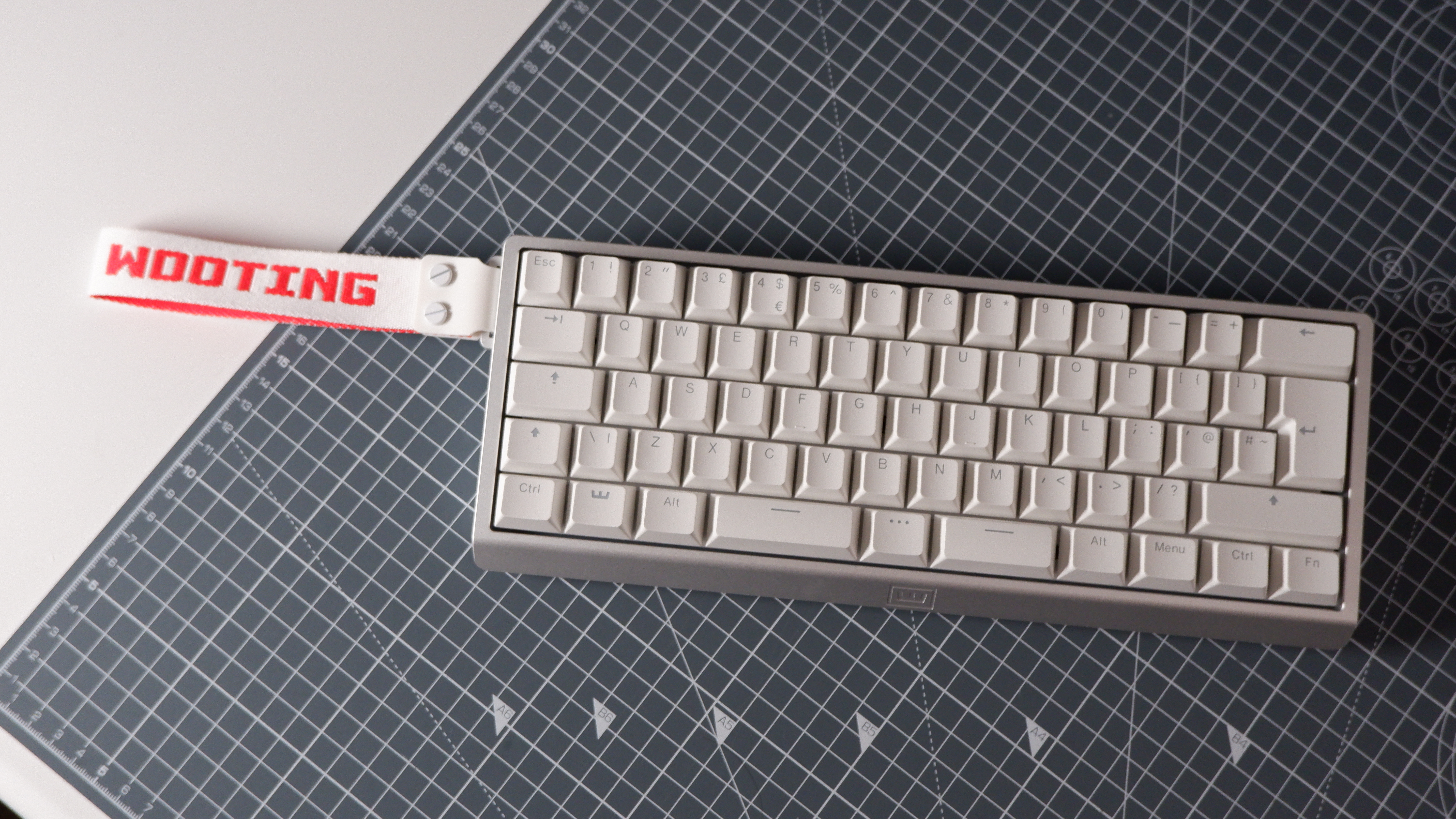 The Wooting 60HE v2 at various stages of being built.