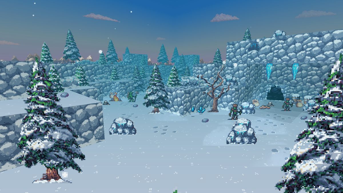 Panoramic view of a snowfield with trees and cliffs visible in background.