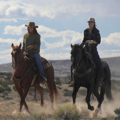 Two women on horseback (Minka Kelly as Quinn and Lauren Glazier as Angie O&rsquo;Grady) in Episode 103 of Ransom Canyon.