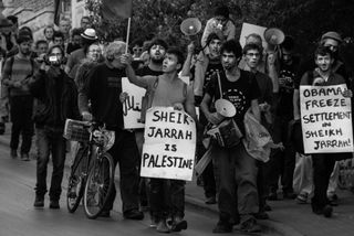 Palestinian and Israeli peaceful protesters in Sheikh Jarrah, East Jerusalem