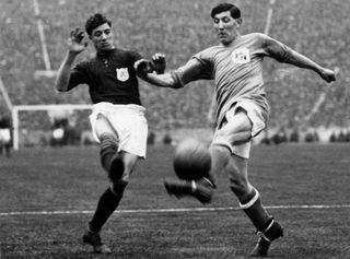 Arsenal's Jimmy Brain and Cardiff captain Fred Keenor battle for the ball in the 1927 FA Cup final.