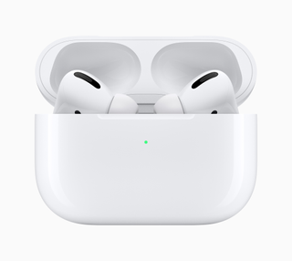 A pair of AirPods Pro inside their Magsafe Charging Case.