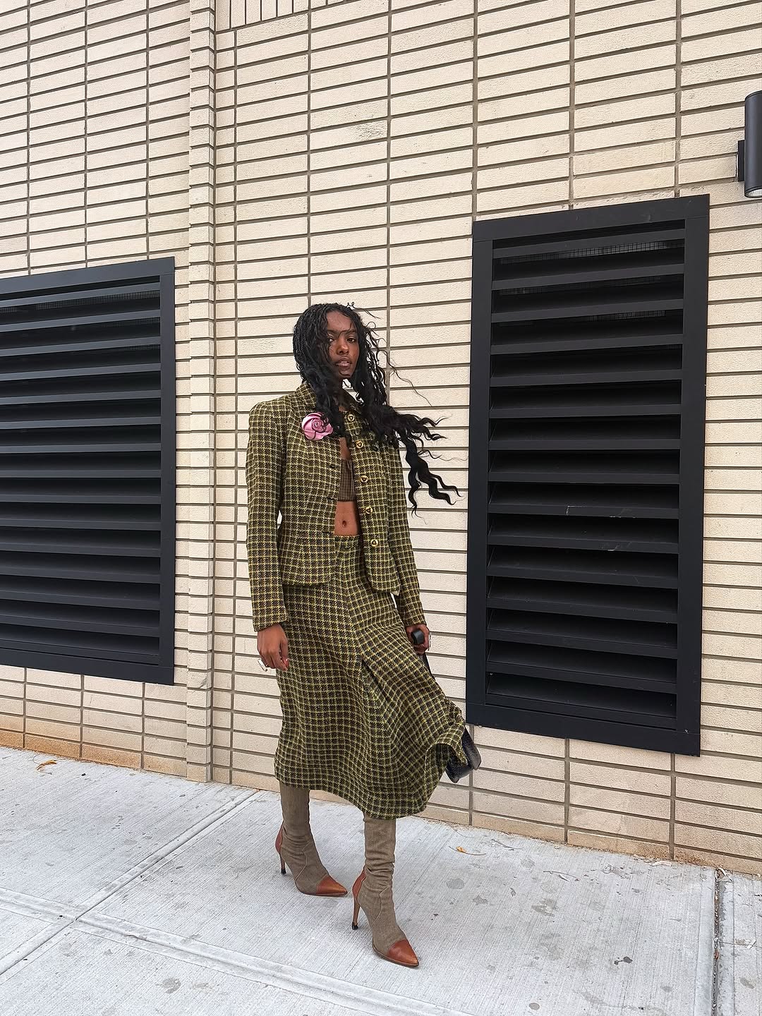 woman wearing plaid maxi skirt outfit 2025