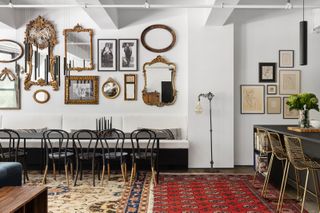 an apartment with colorful persian rugs on the floor