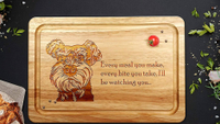 Dog-themed Wooden Chopping Board
Is your dog dad a dab hand in the kitchen? Then you need this dog-inspired chopping board. Don't worry if you don't own a Miniature Schnauzer as there are plenty of other dog breeds available to choose from. Added bonus if your dog dad is a music lover; we love the dog-inspired twist on popular lyrics.