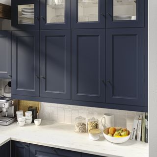 IKEA navy kitchen with wall cupboards