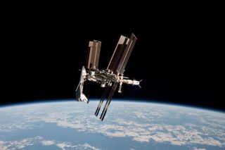 The space shuttle Endeavour and International Space Station shine front and center in this amazing (and historic) photo of the two vehicles docked together as seen from a Russian Soyuz spacecraft. Astronaut Paolo Nespoli snapped this view and others durin
