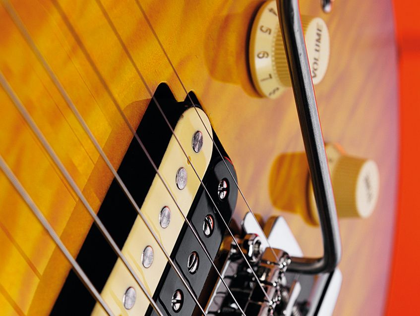 The pickups have alnico magnets and retain a hint of EVH with zebra bobbins.