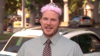 A screenshot of Chris Pratt on Parks and Rec wearing a tiara.