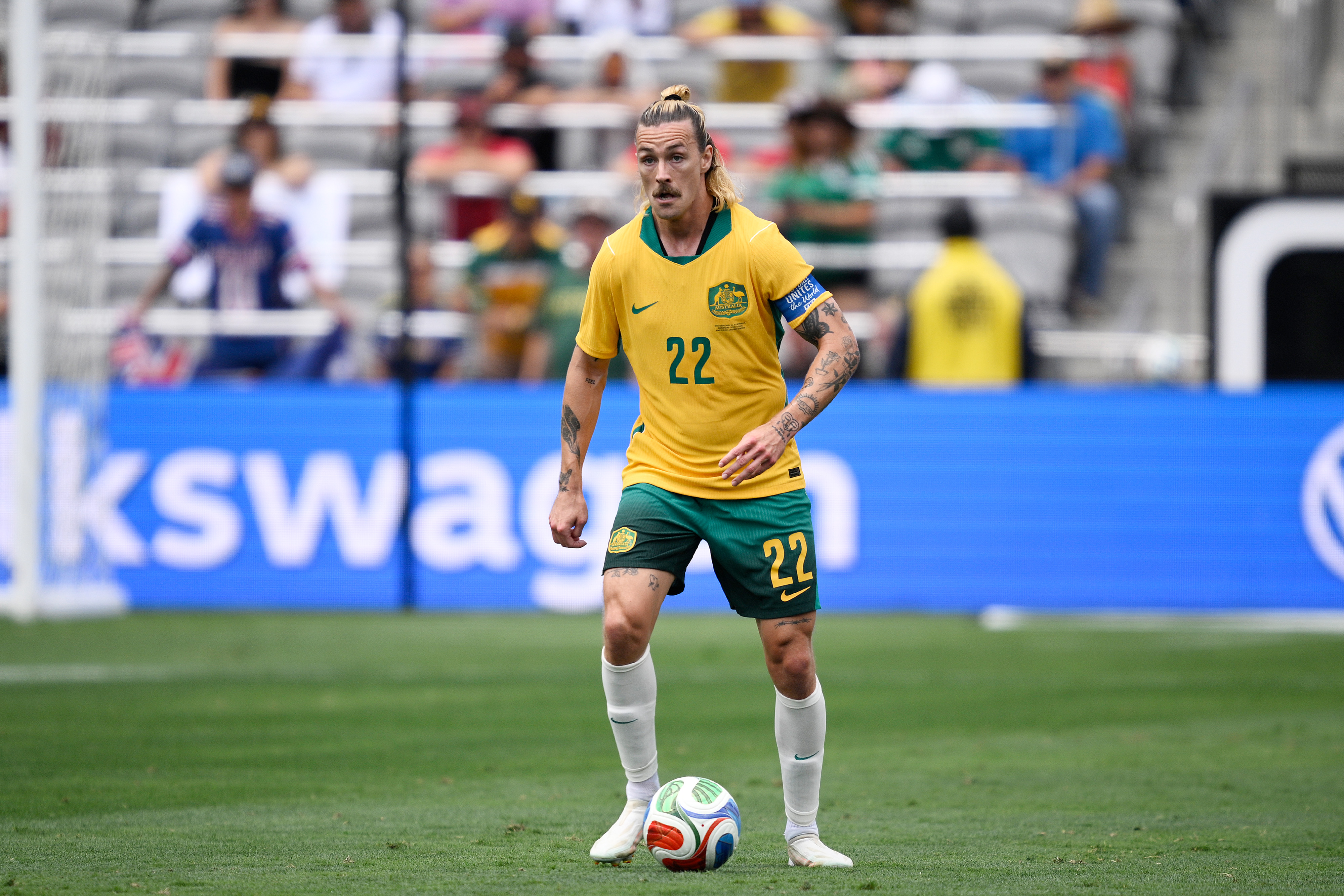 Australia skipper Jackson Irvine with the ball at his feet.