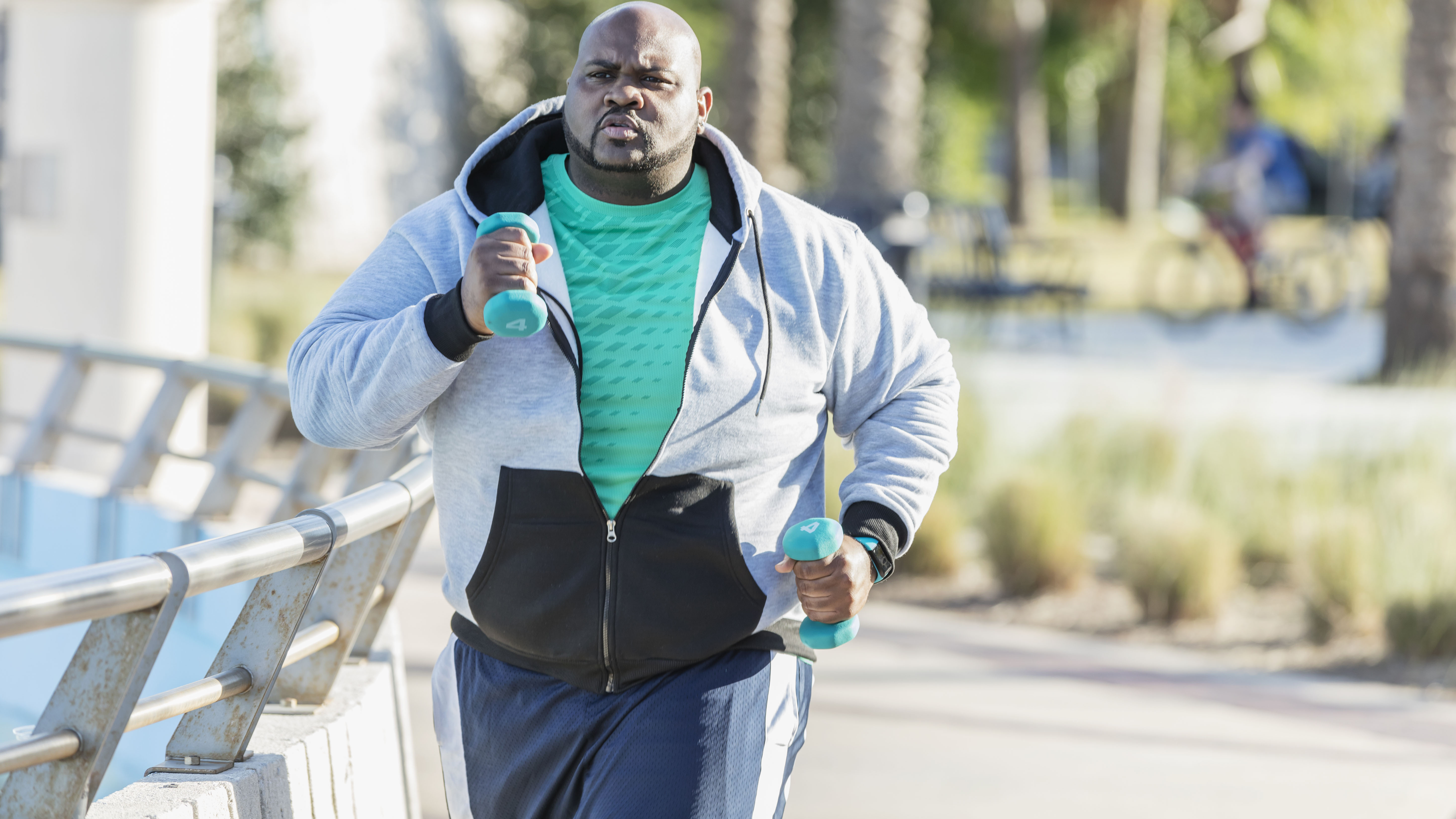 Man walking with weights