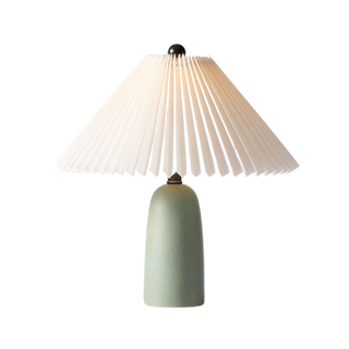table lamp with green base and large fluted shade