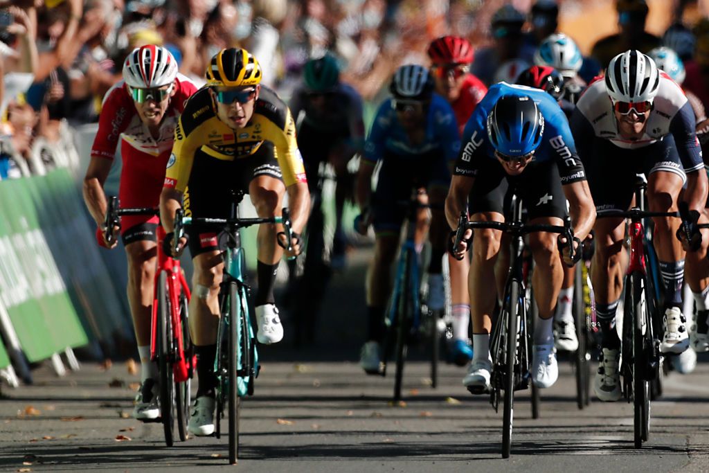 Stage winner Team Jumbo rider Belgiums Wout van Aert 2ndL sprints to crosses the finish line at the end of the 7th stage of the 107th edition of the Tour de France cycling race 168 km between Millau and Lavaur on September 4 2020 Photo by BENOIT TESSIER POOL AFP Photo by BENOIT TESSIERPOOLAFP via Getty Images