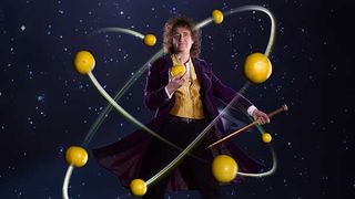Brian May being orbited by grapefruit