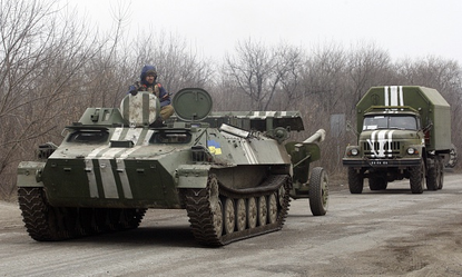 Ukraine begins to withdraw its heavy weapons 